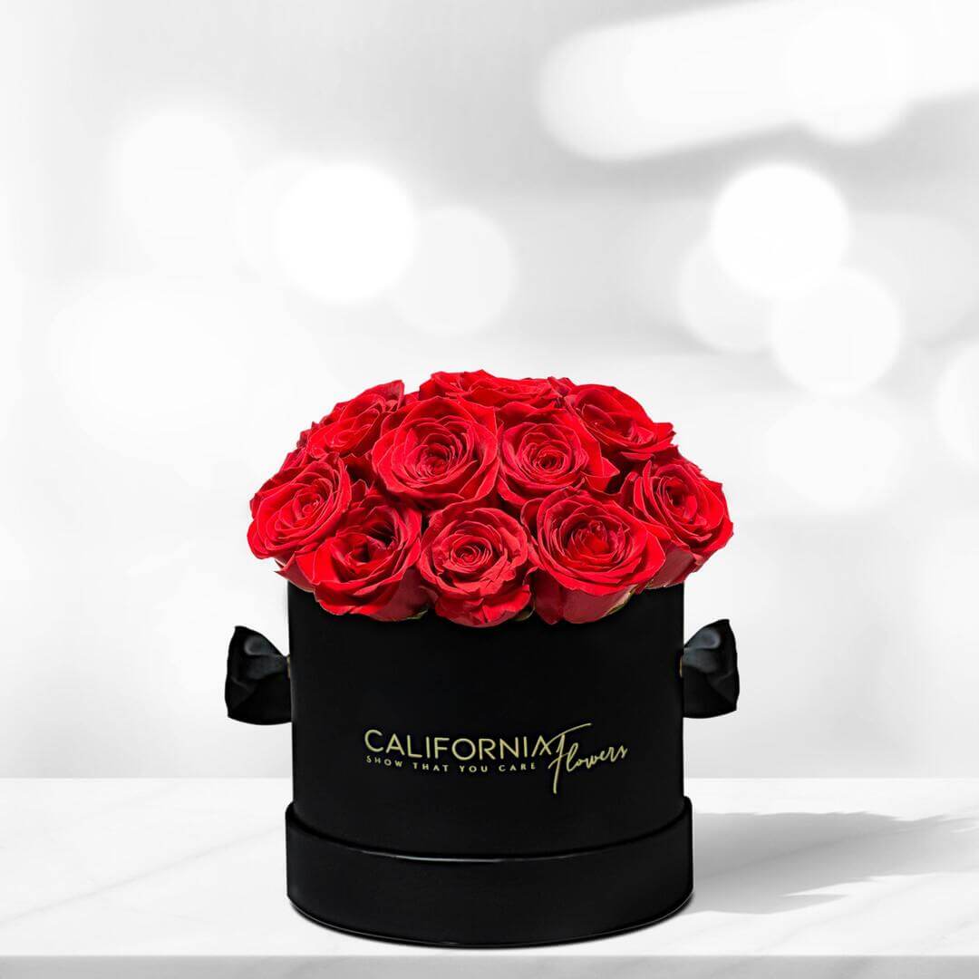 Cutie neagra cu 17 trandafiri rosii