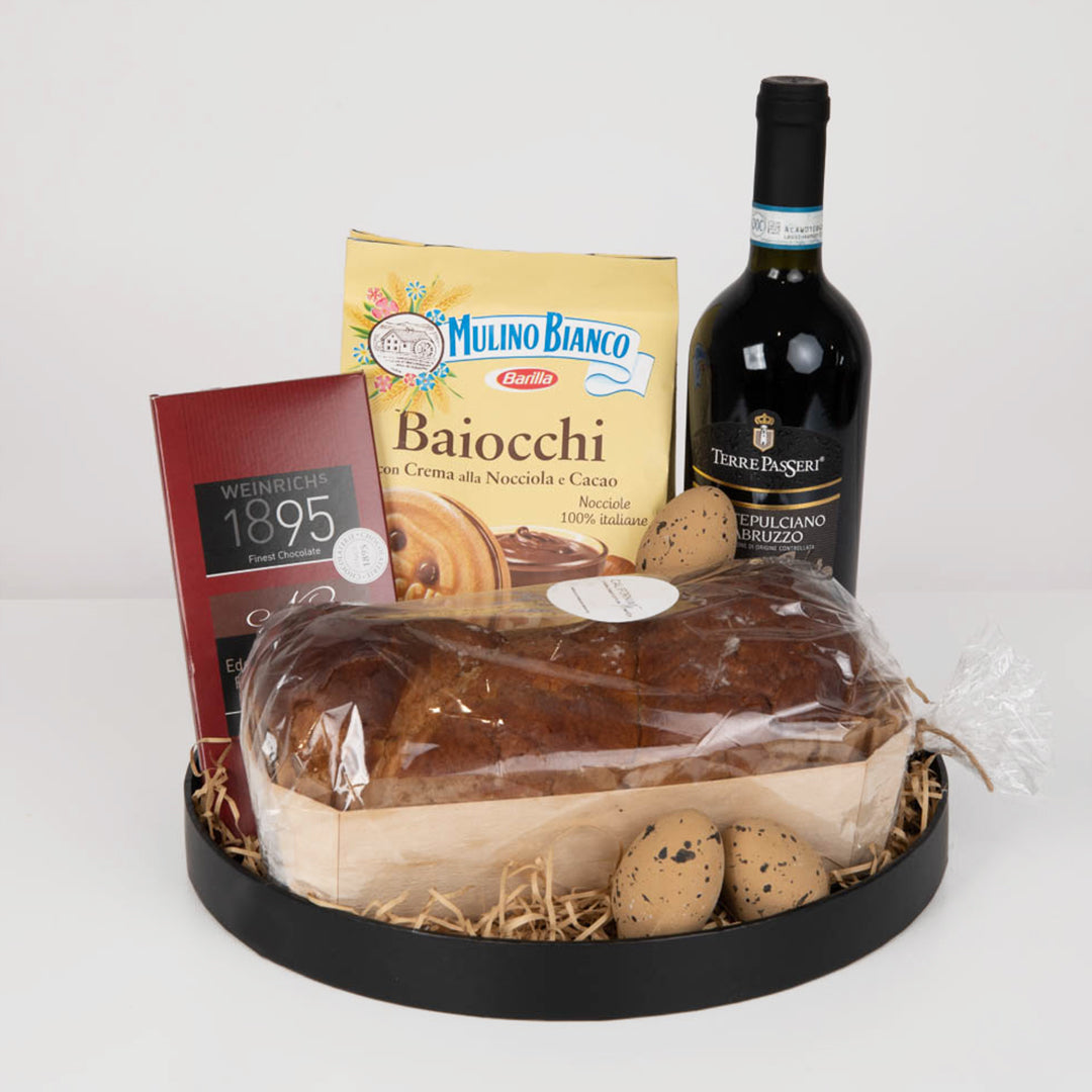 Gift package with red wine and chocolate