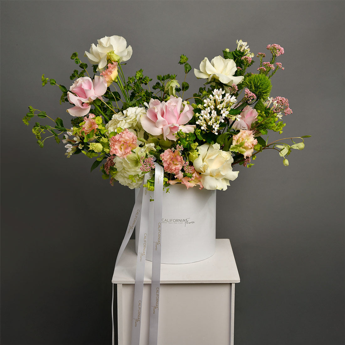 Floral arrangement in a box with special roses, lisianthus and bouvardia, 3, Californiaflowers.ro