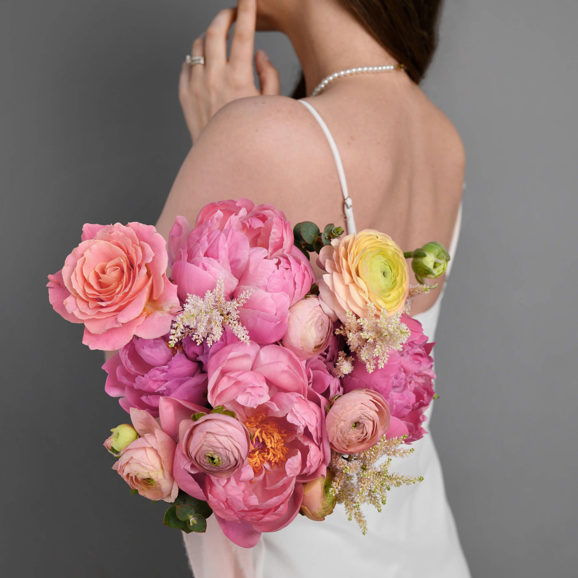 Bridal bouquet with peonies and roses