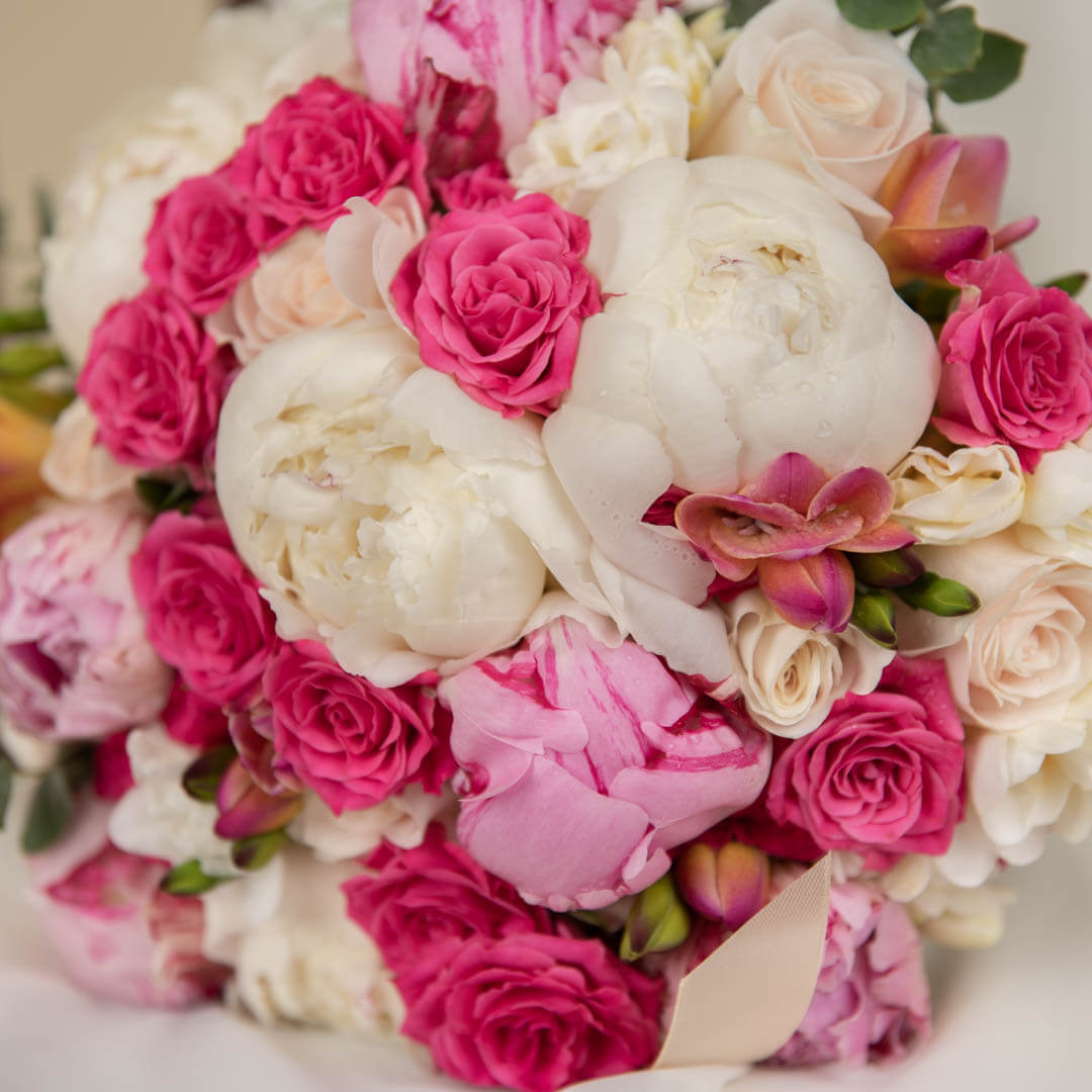 Bridal bouquet with peonies and freesias