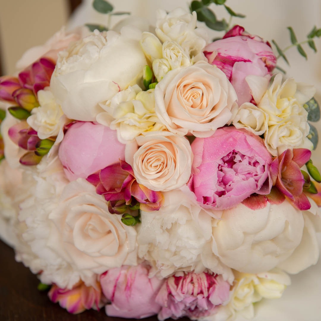 Bridal bouquet with freesias and peonies