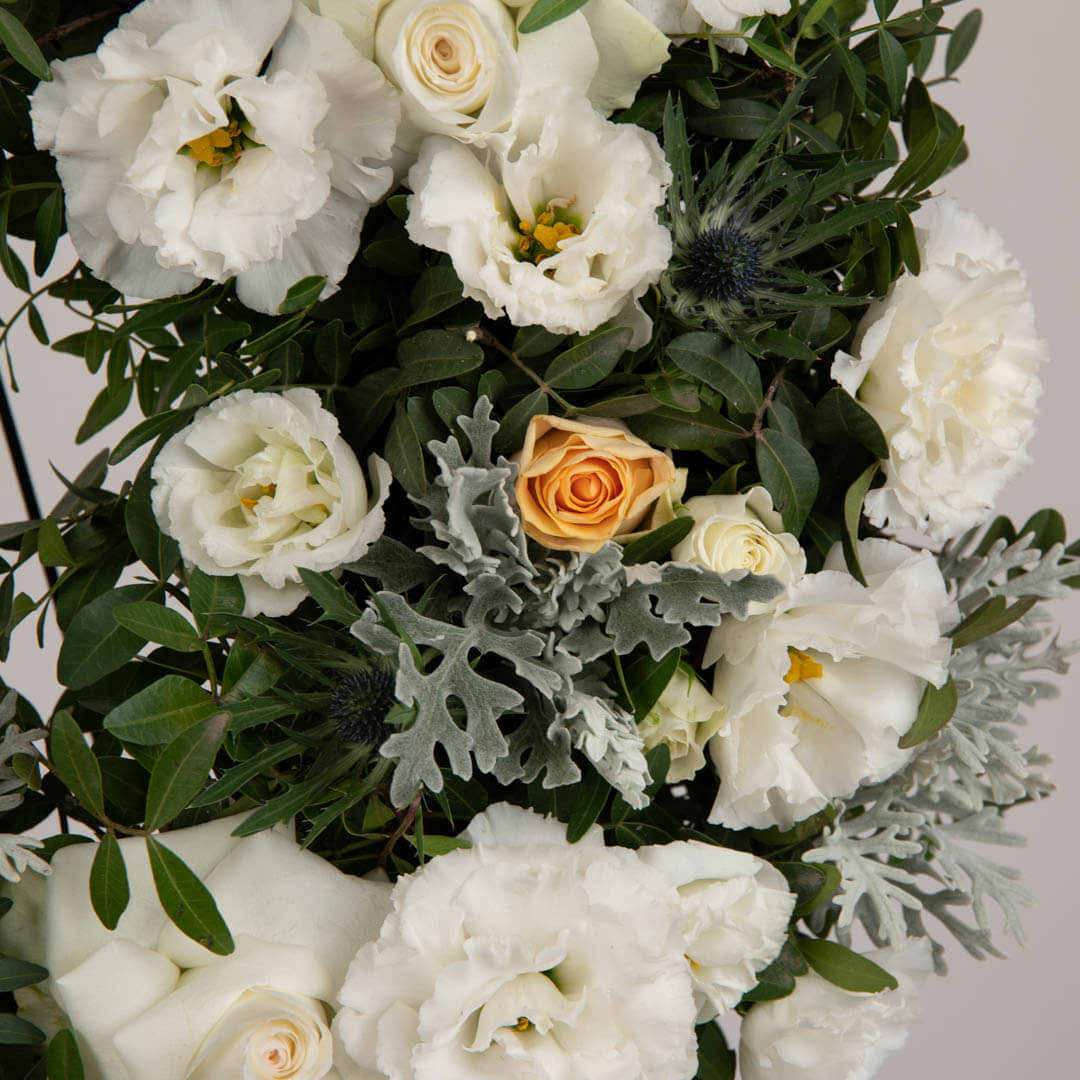 Funeral wreath with roses and lisianthus