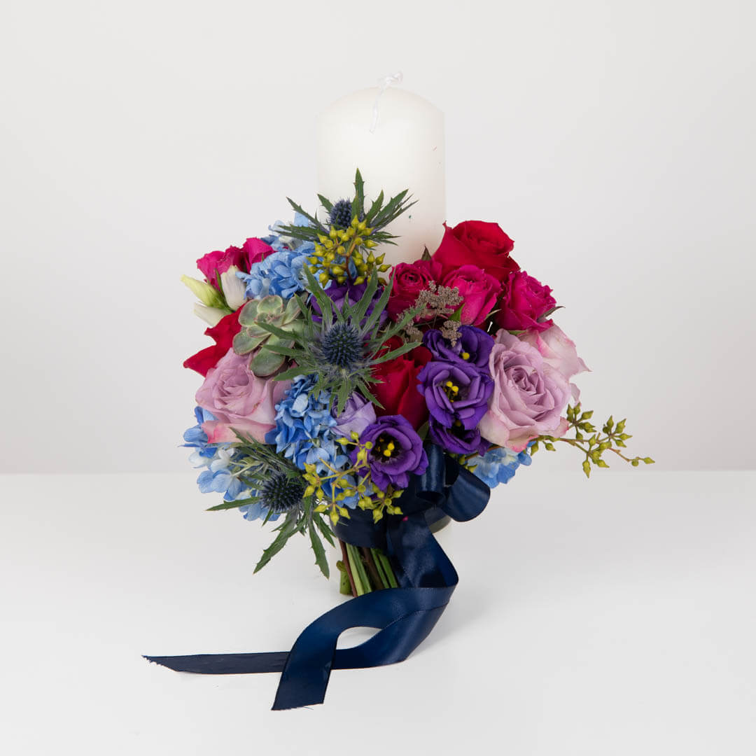 Candles with hydrangea and roses