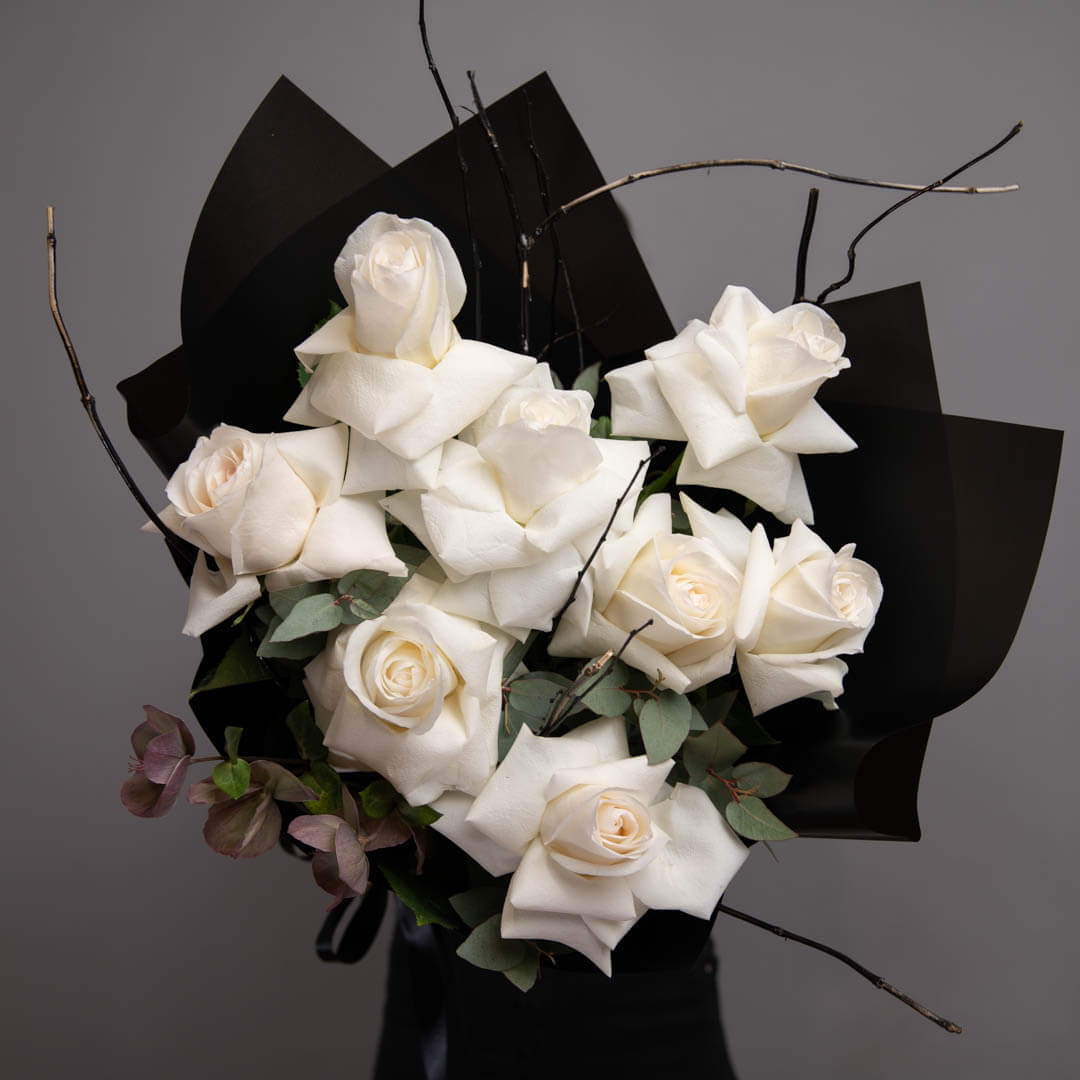 Funeral bouquet with roses and eucalyptus