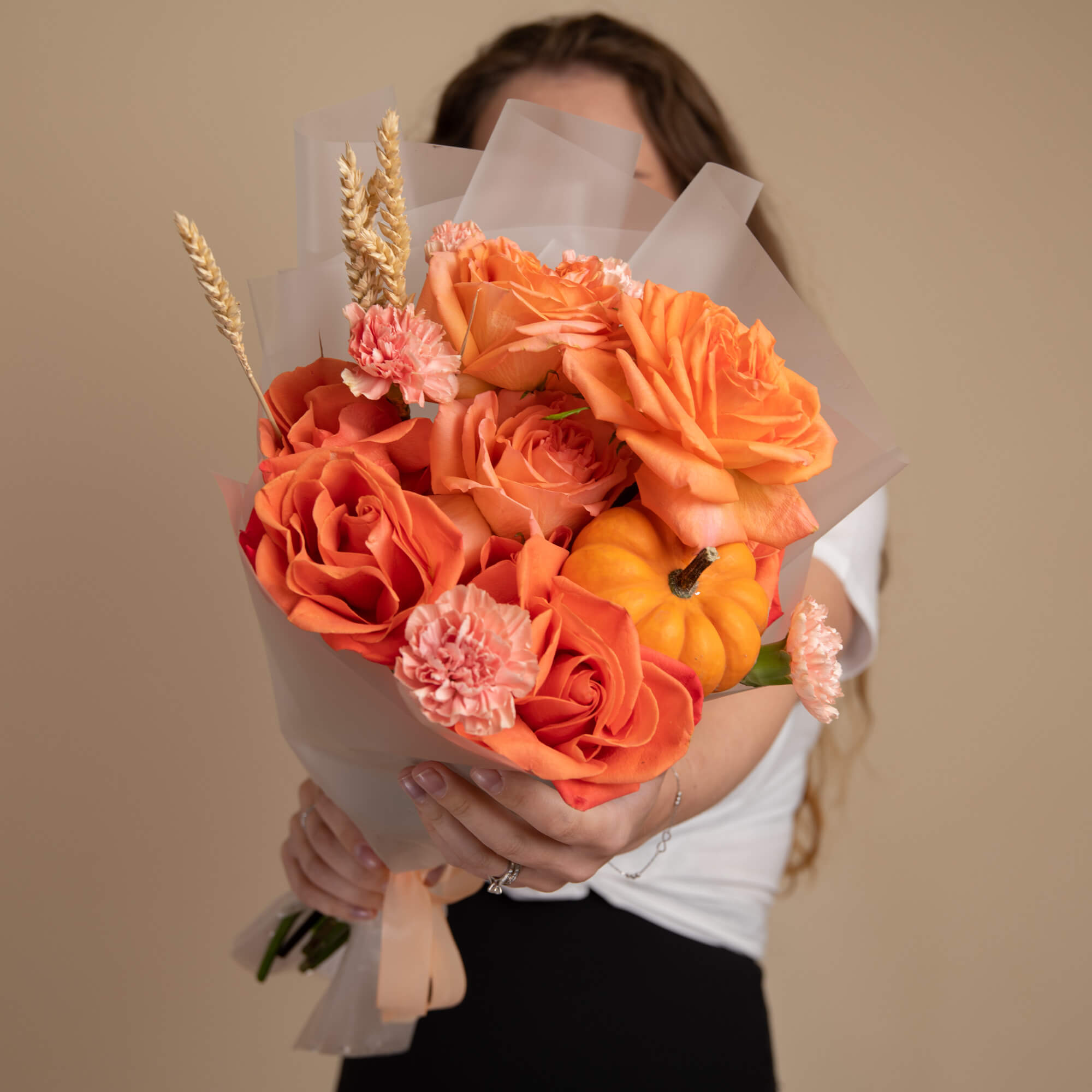 Orange bouquet with roses and pumpkin