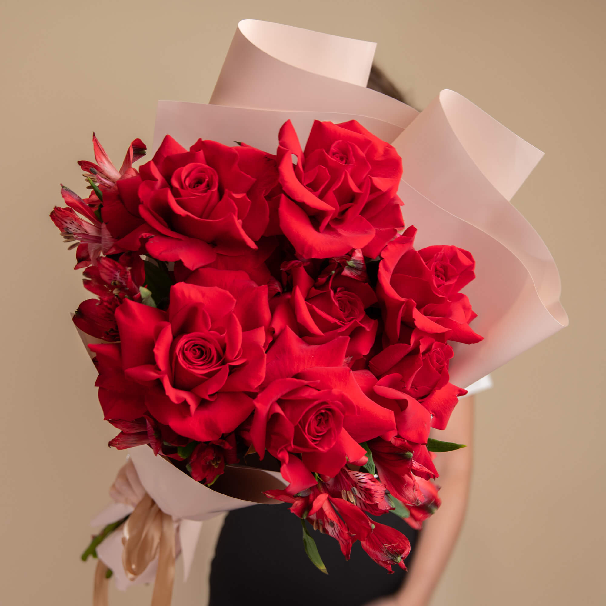 Bouquet with roses and red alstroemeria