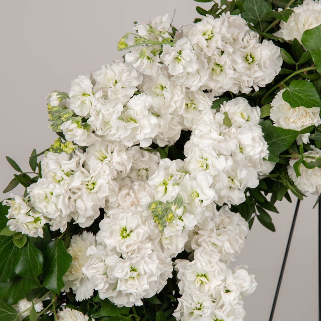 Funeral wreath with matthiola, carnations and eryngium