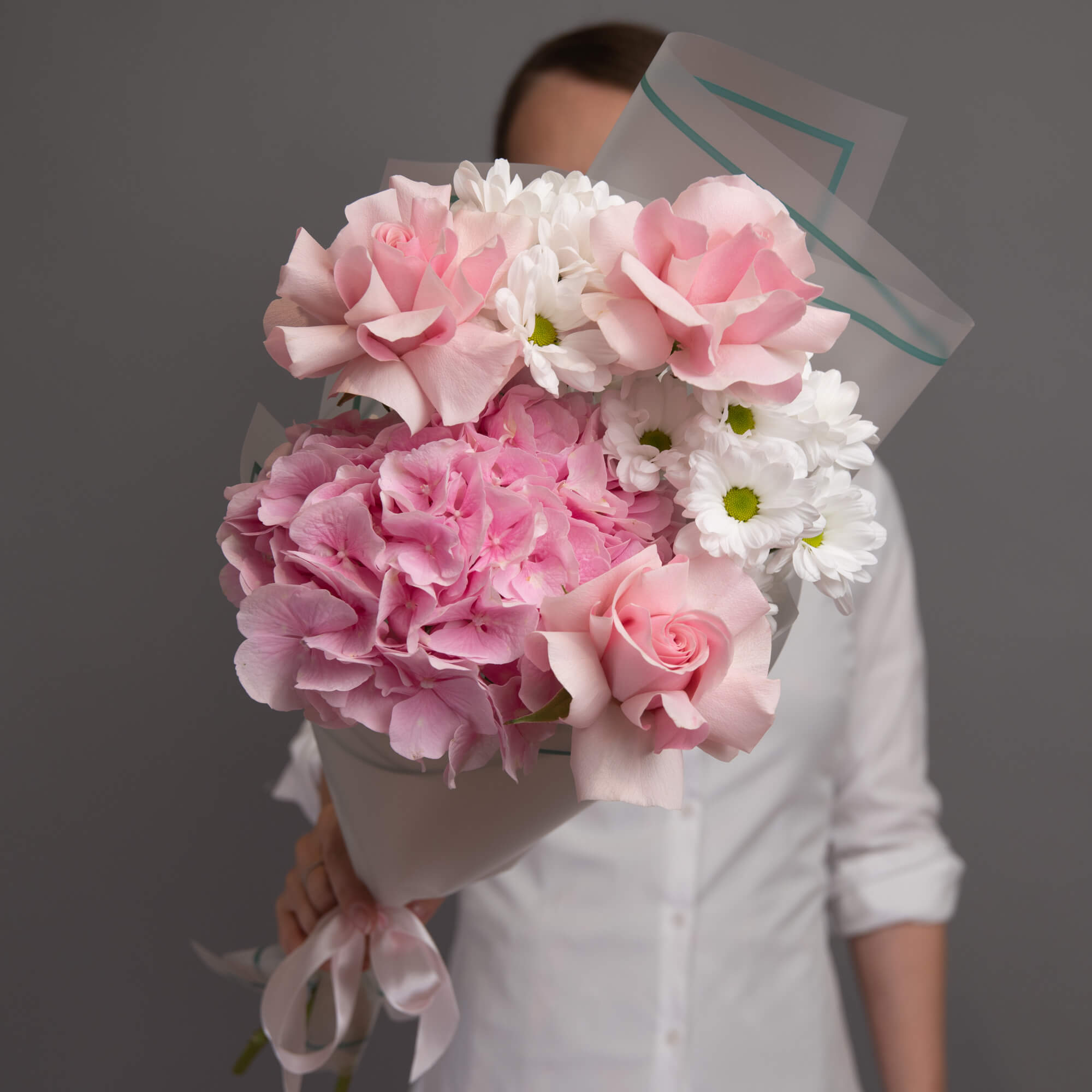 Bouquet with pink roses and chrysanthemums