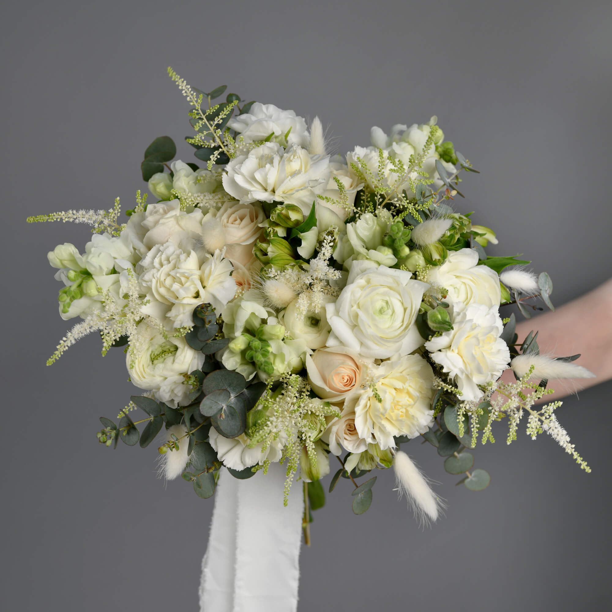 Bridal bouquet with ranunculus and astilbe