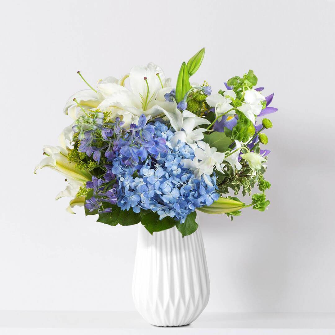 Bouquet with hydrangea, lilies and delphinium