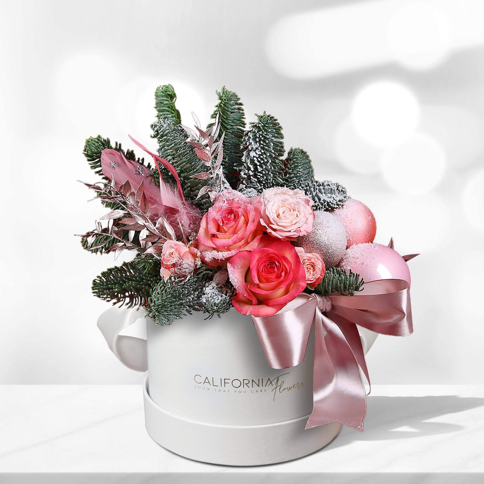 White box with pink roses and fir tree