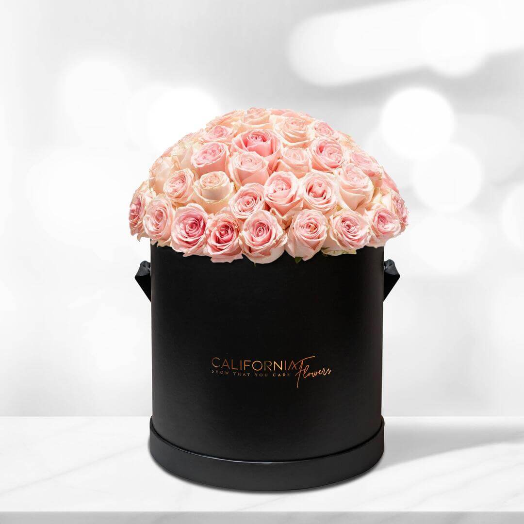 Black box with 63-65 pink roses