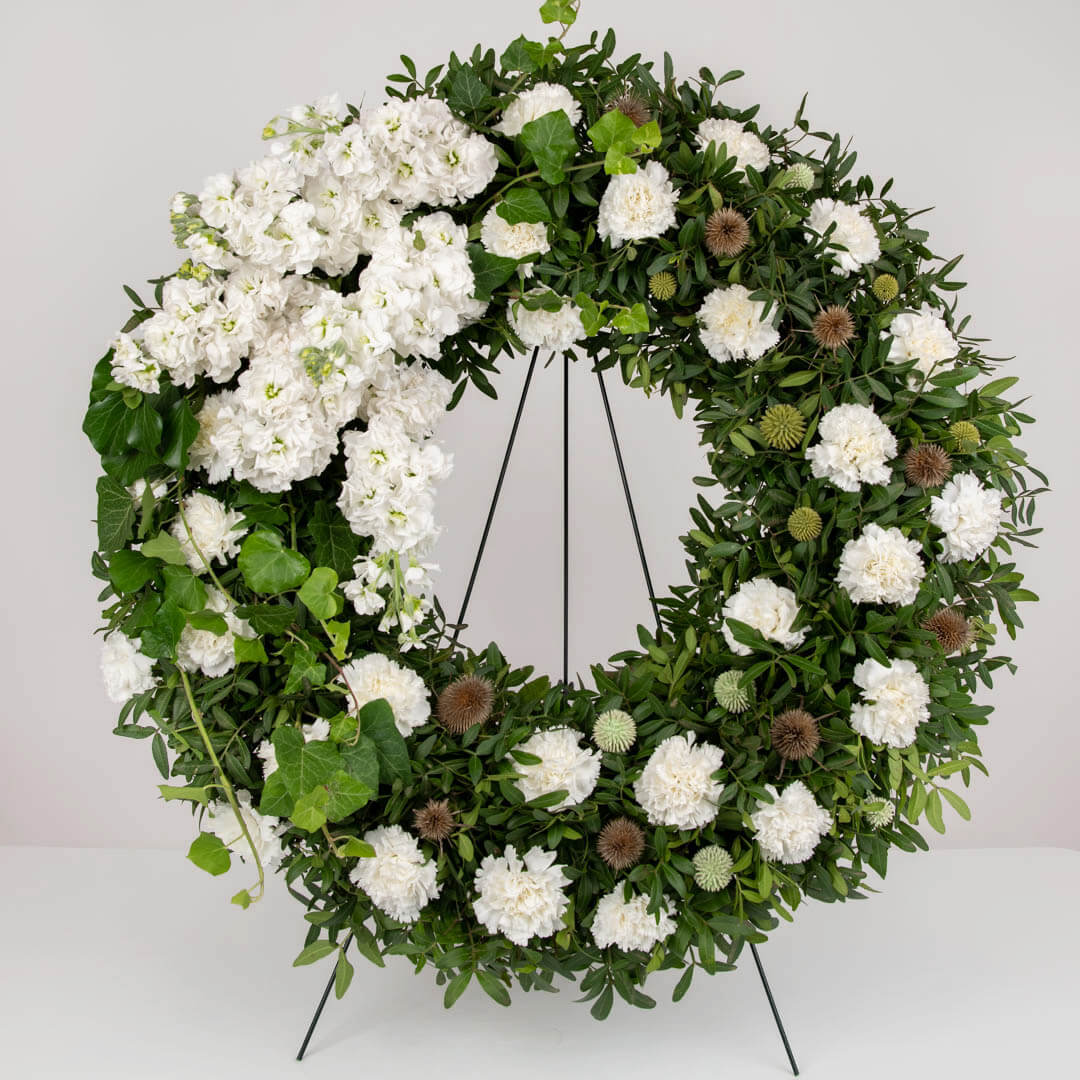 Funeral wreath with matthiola, carnations and eryngium