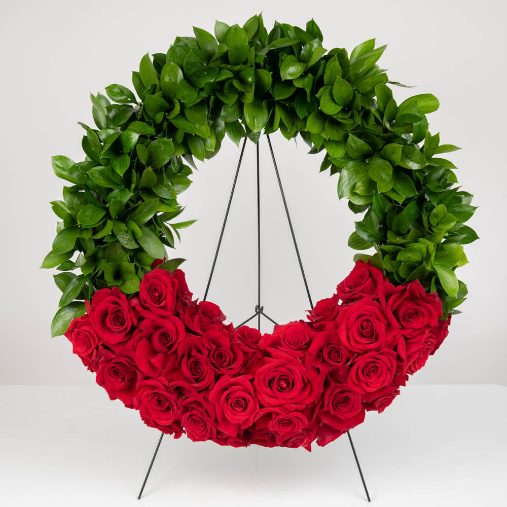Coroana funerara rotunda cu trandafiri rosii