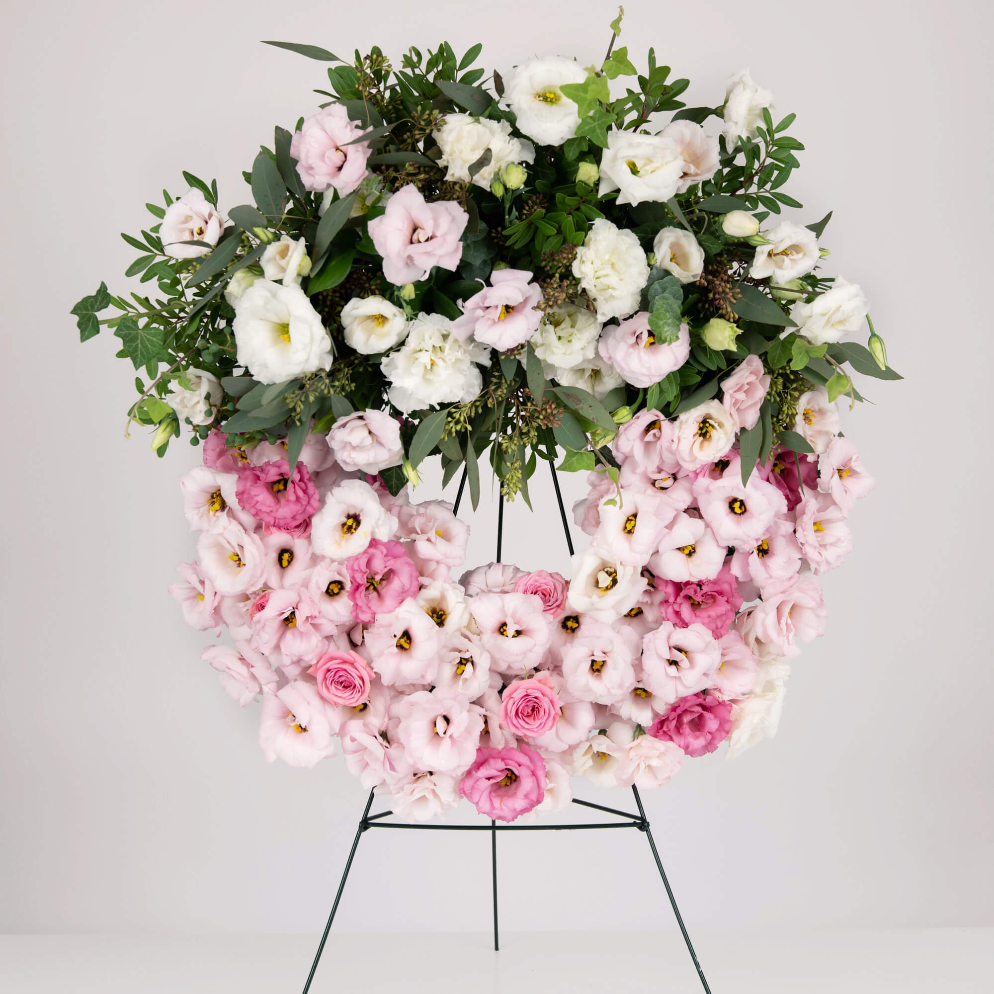 Funeral wreath with pink lisianthus