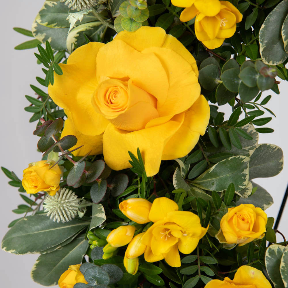 Funeral wreath with yellow roses