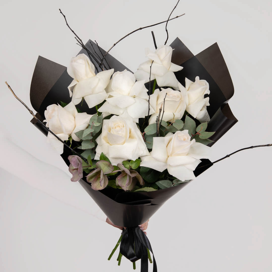 Funeral bouquet with roses and eucalyptus