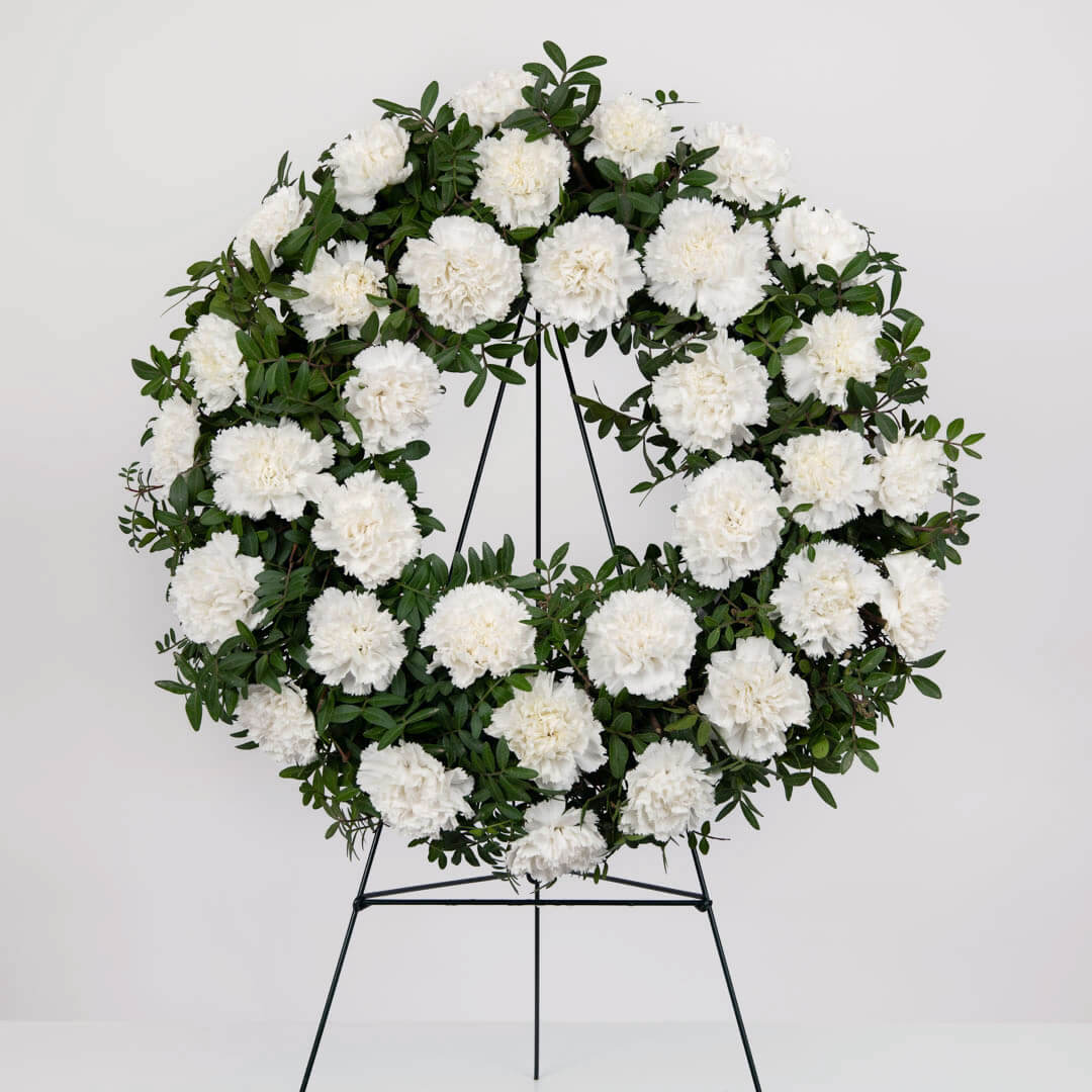 Funeral wreath with white carnations