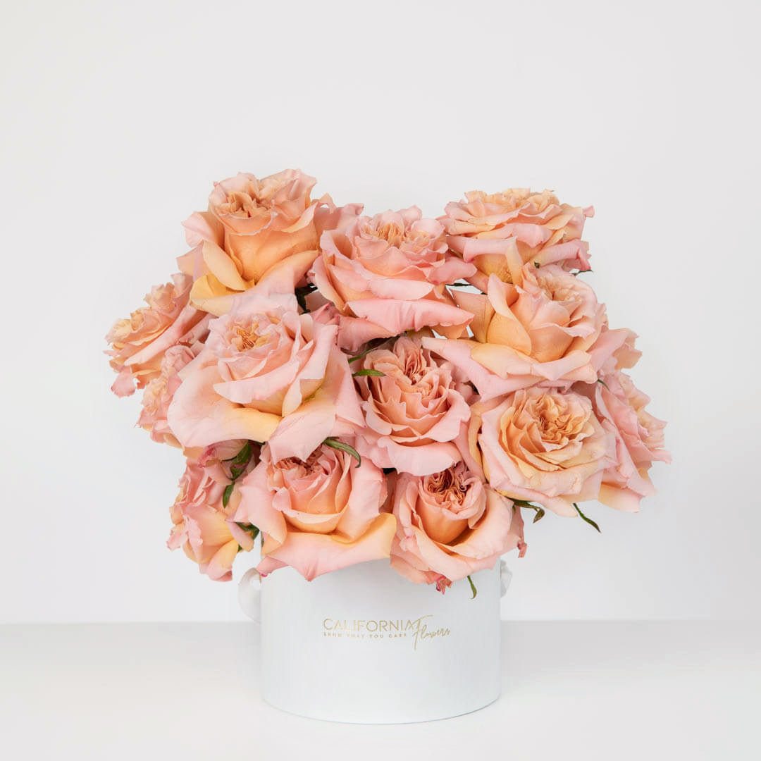 Arrangement in a white box with special roses