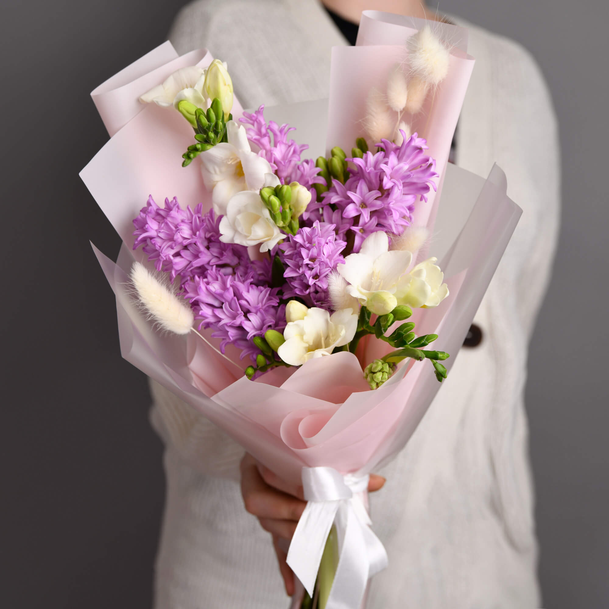 Bouquet with hyacinths and white freesias