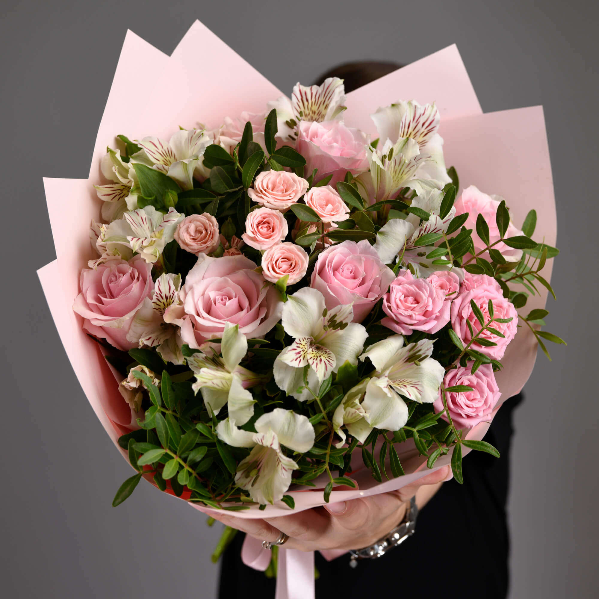 Bouquet with pink roses, alstroemeria and mini roses