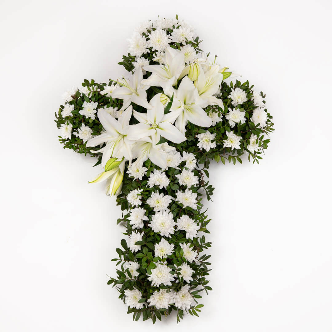 Funeral cross with lilies and chrysanthemums
