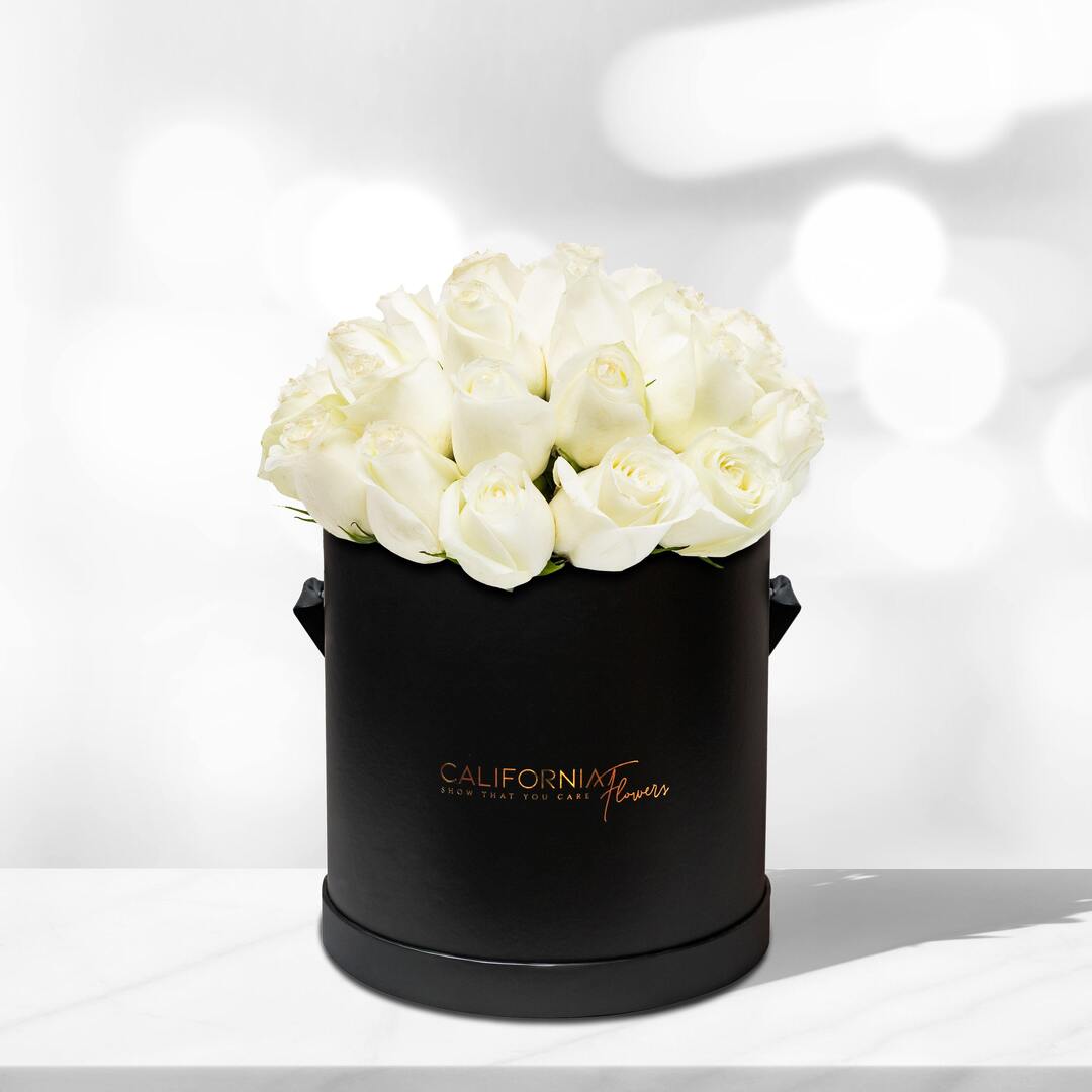 Black box with 21 white roses