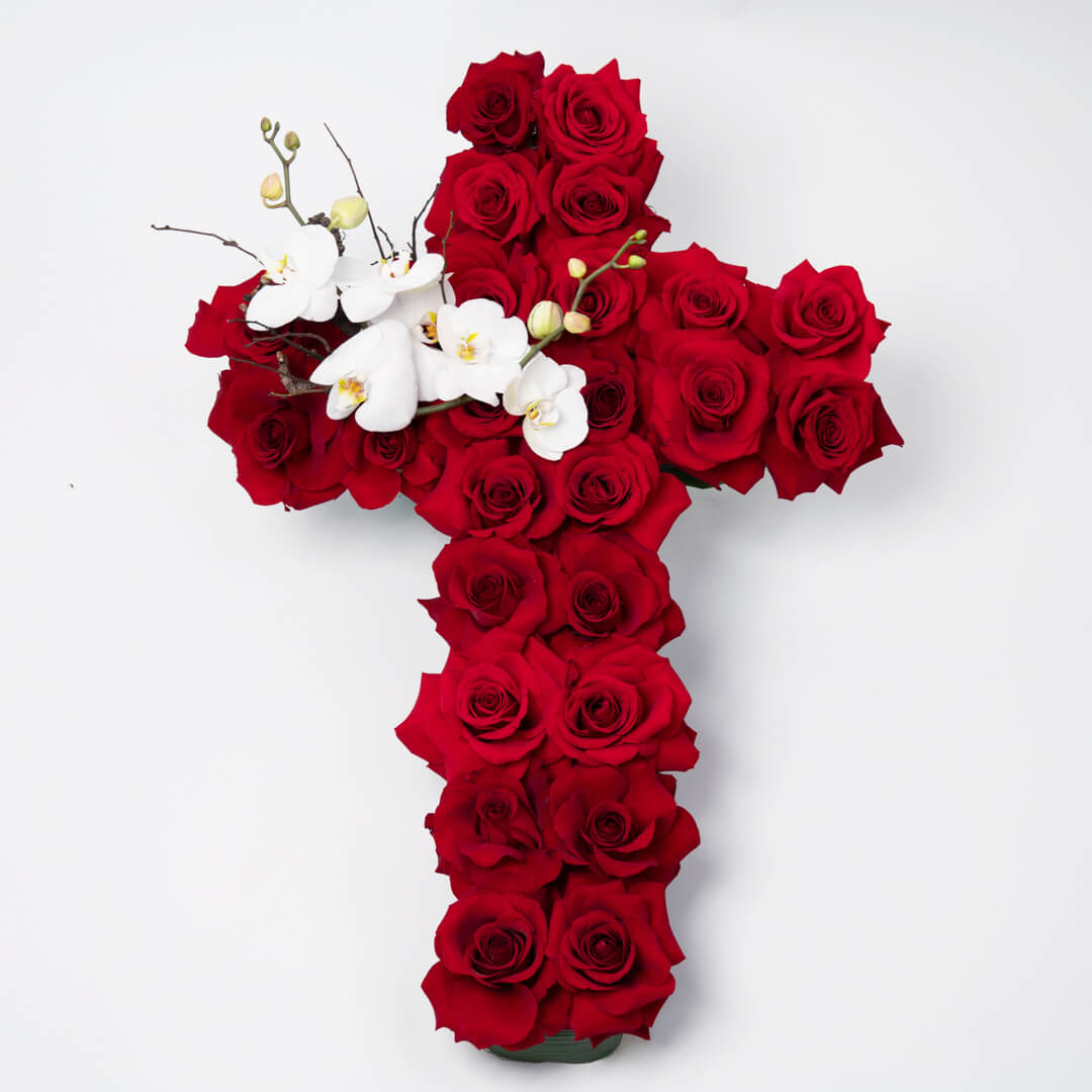 Cross with roses and phalaenopsis
