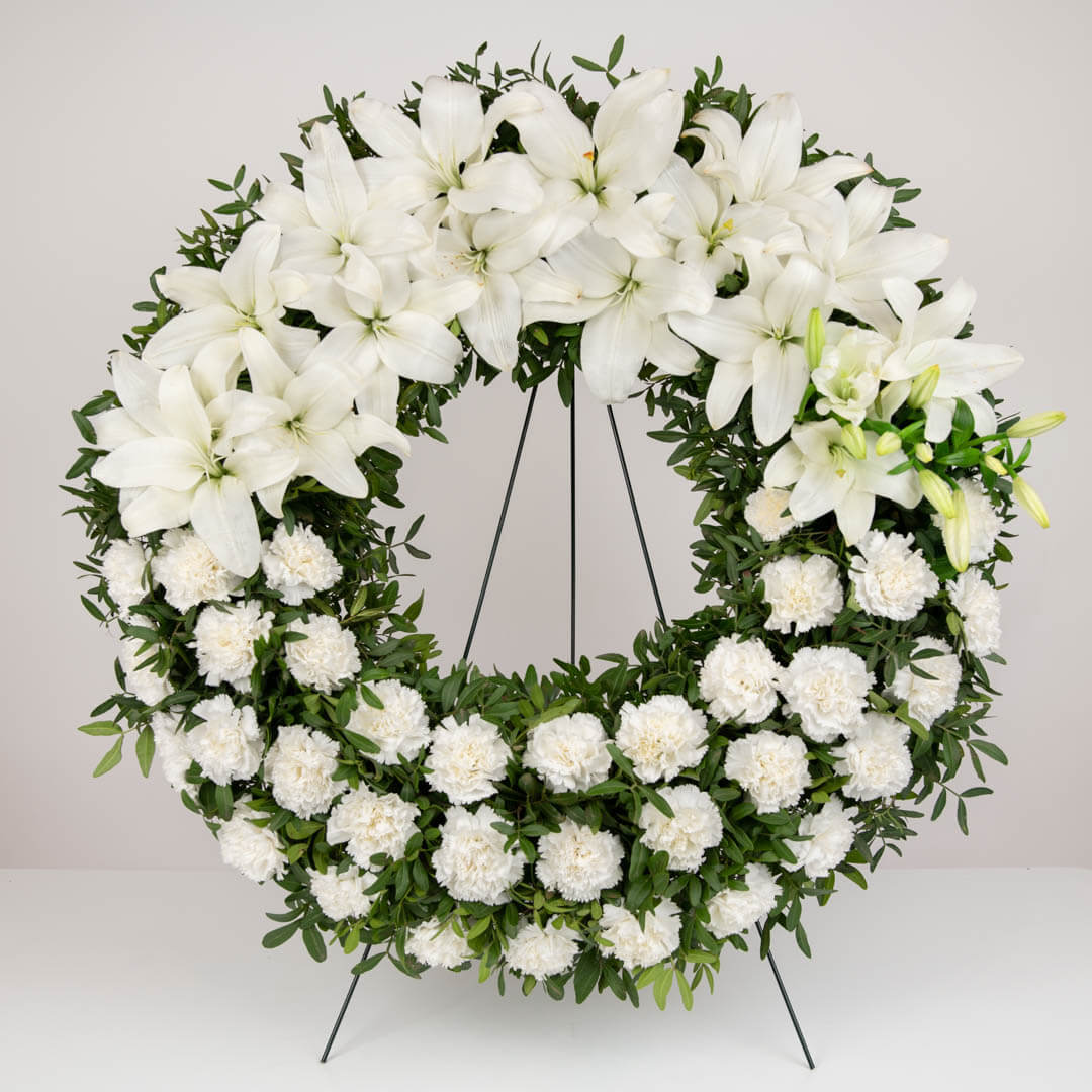 Funeral wreath with lilies and carnations