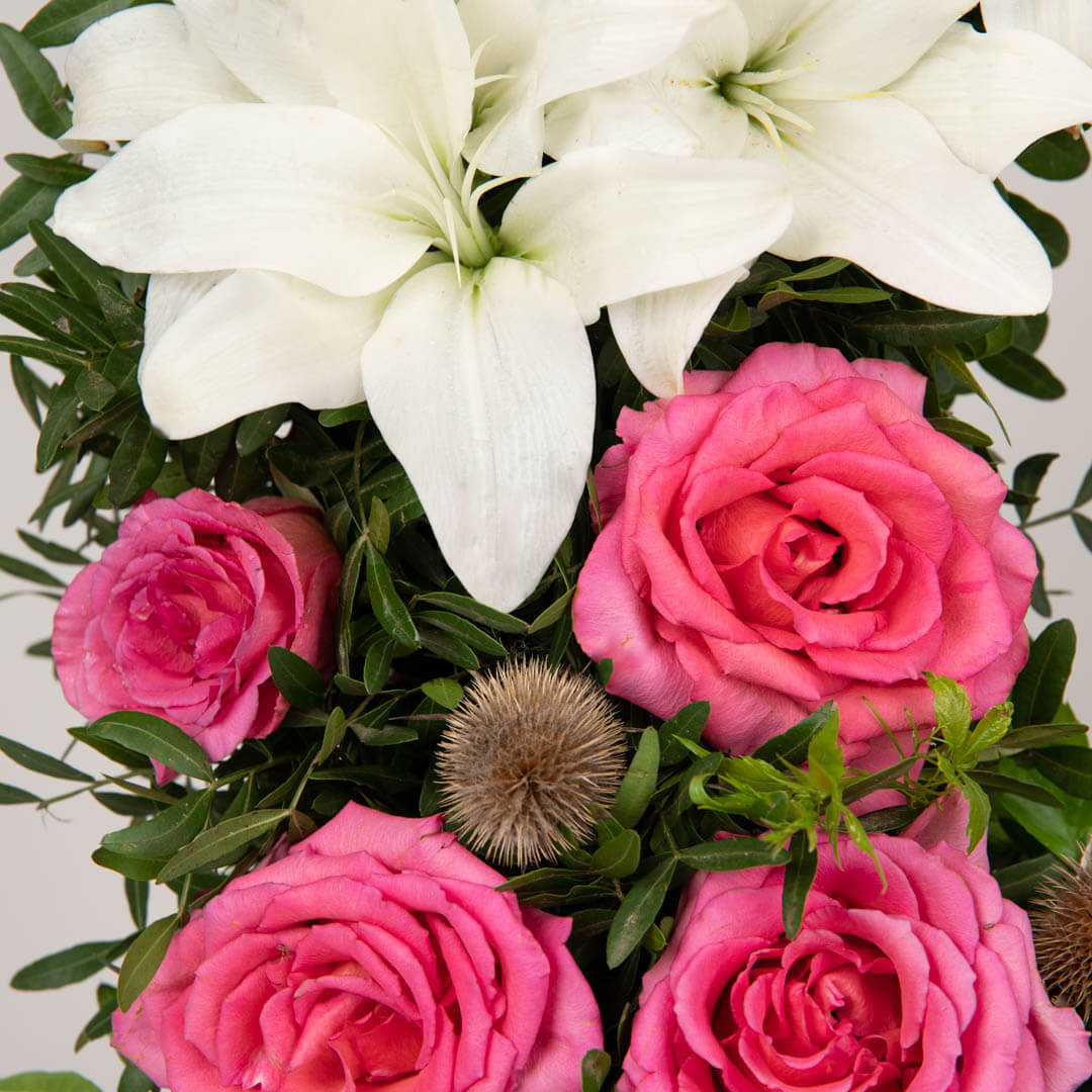 Funeral wreath with lilies and roses