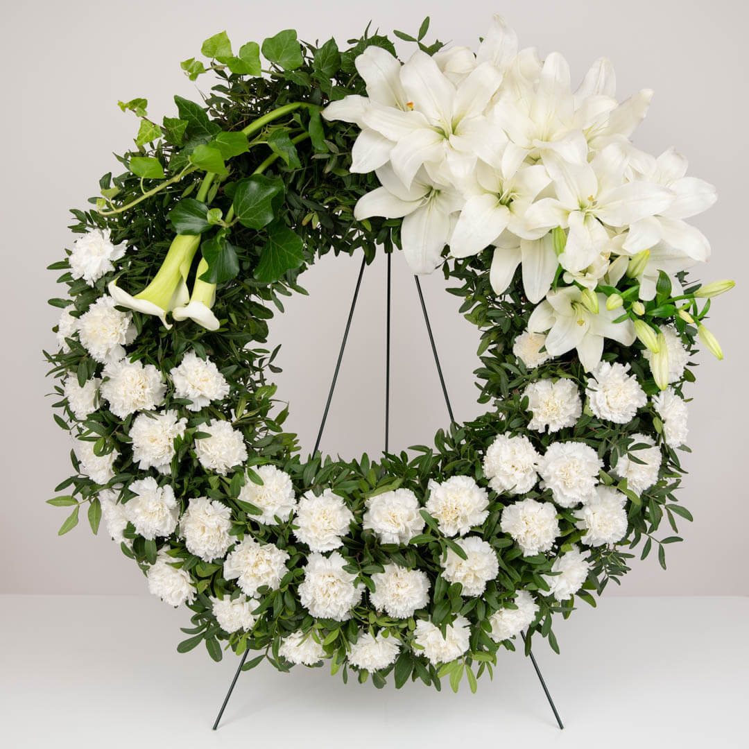 Funeral wreath with lilies, carnations and carnations