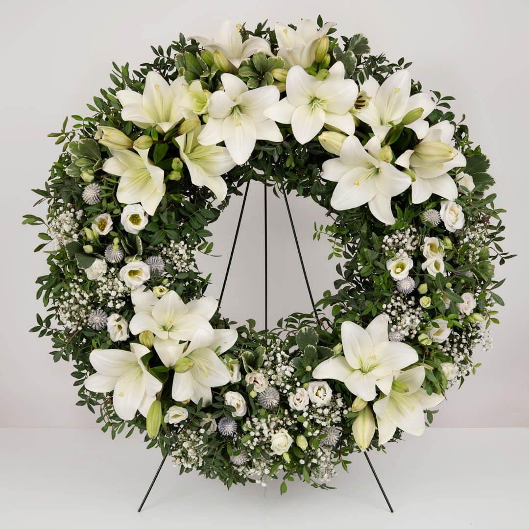 Funeral wreath with lisianthus and white lilies