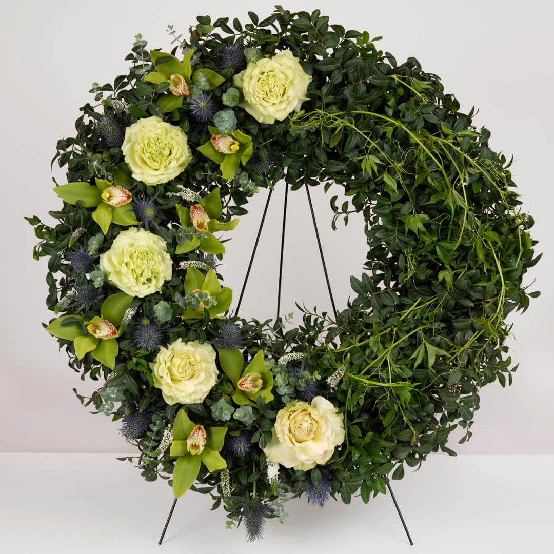 Funeral wreath with roses and cymbidium