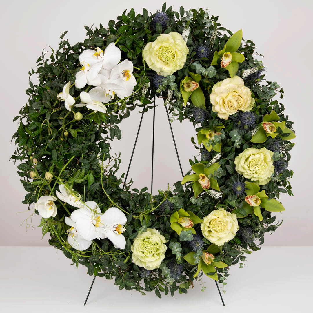 Funeral wreath with cymbididum, roses and phalaenopsis